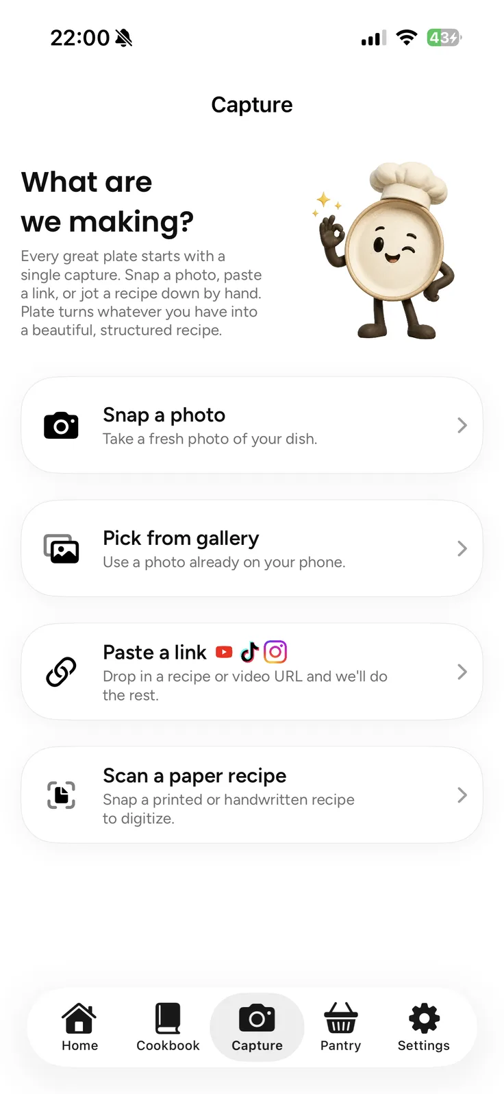 Plate's Capture screen titled What are we making?, with four options: Snap a photo, Pick from gallery, Paste a link, and Scan a paper recipe, described as snap a printed or handwritten recipe to digitize