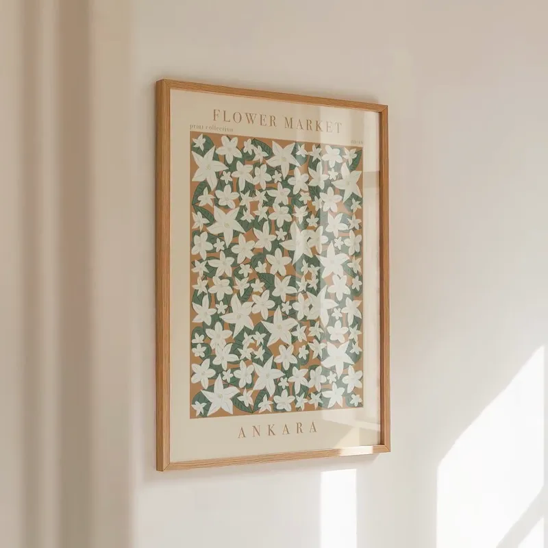 Ankara Flower Market Print: White star-shaped flowers on warm ochre, framed